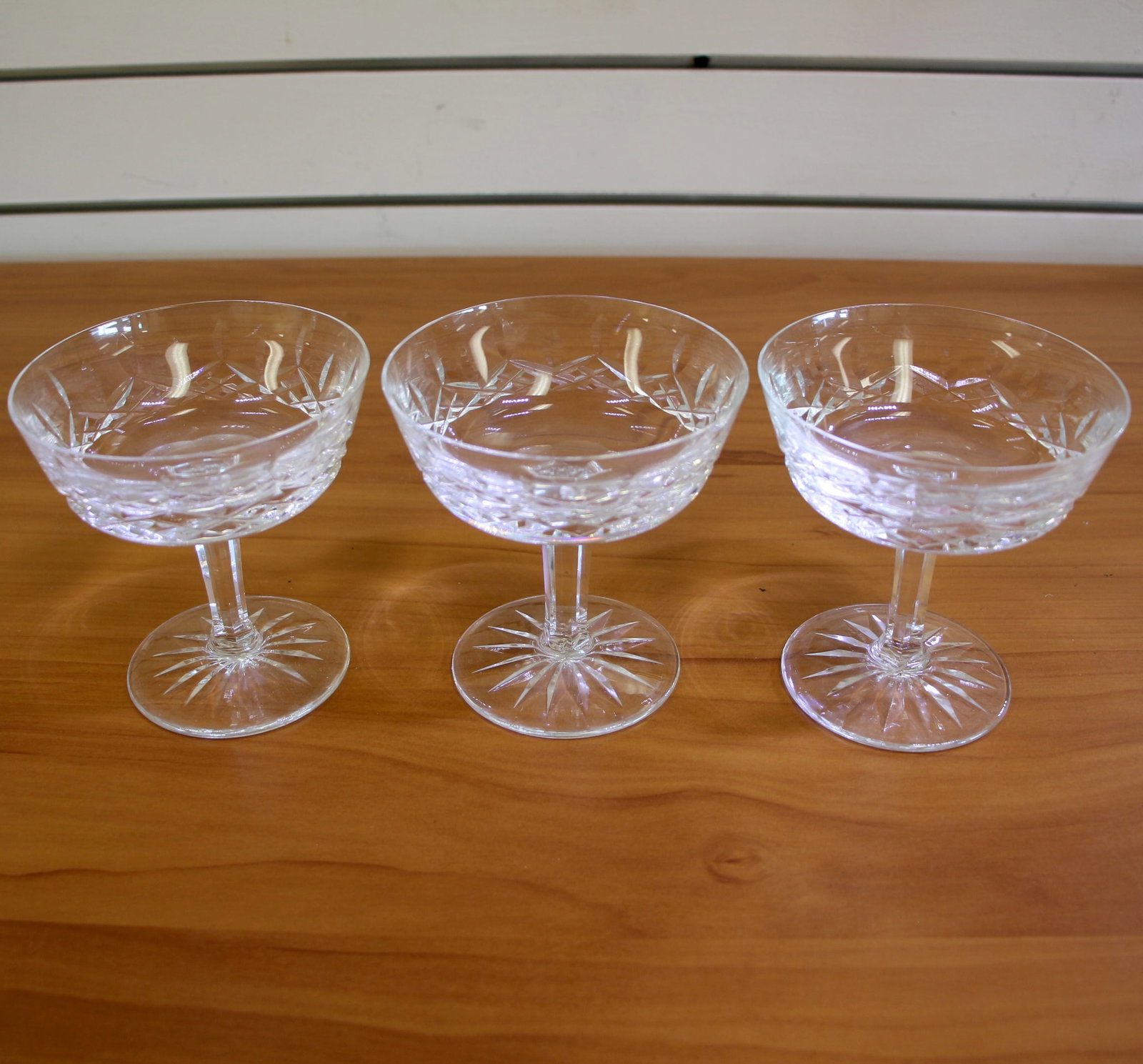 Waterford Lismore Crystal Champagne Tall Sherbet Glasses Set of 3: Three 4 1/8 inch champagne or tall sherbet glasses. Old Gothic Waterford mark. Excellent condition.