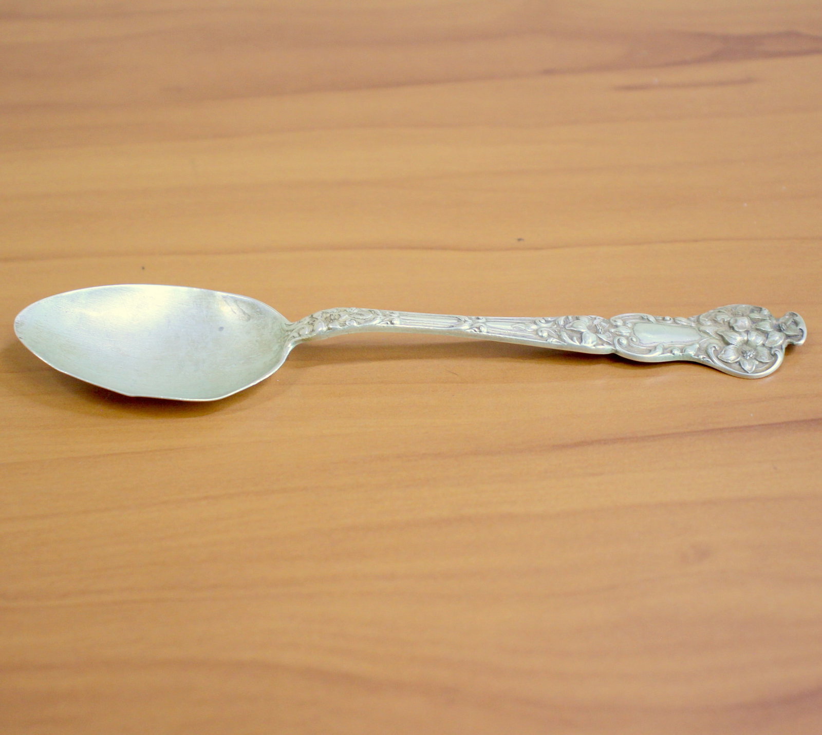 Watson "Bridal Flower" Sterling Silver Teaspoon: In .925 Sterling Silver. Contains one 6 inch teaspoon. Misshapen bowl. 20.3g.