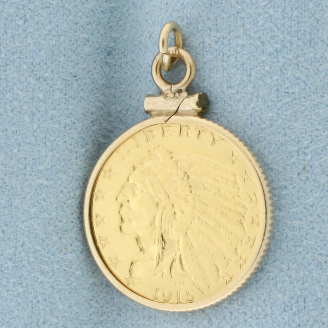 1915 Indian Head Gold Coin Charm or Pendant in 14k Yellow Gold Bezel: In 14k Yellow Gold Bezel. Contains 1915 2 1/2 Dollar Indian Quarter Eagle Indian Head coin. 1 inch long including bale. 3/4 inch wide. 5.2g.