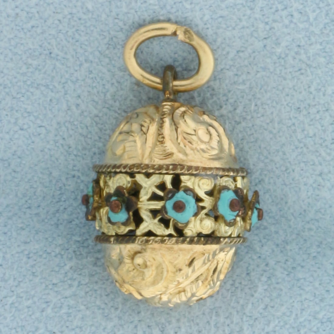 Antique Egg Orb Charm: 14k Gold Plated. 7/8 inch long including bale. 1/2 inch wide. 3.1g.