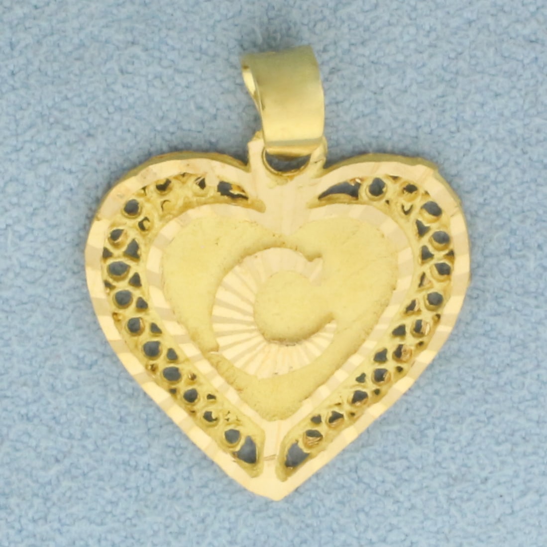 Initial C Heart Pendant in 22k Yellow Gold: In 22k Yellow Gold. 1 inch long including bale. 3/4 inch wide. 1.8g.