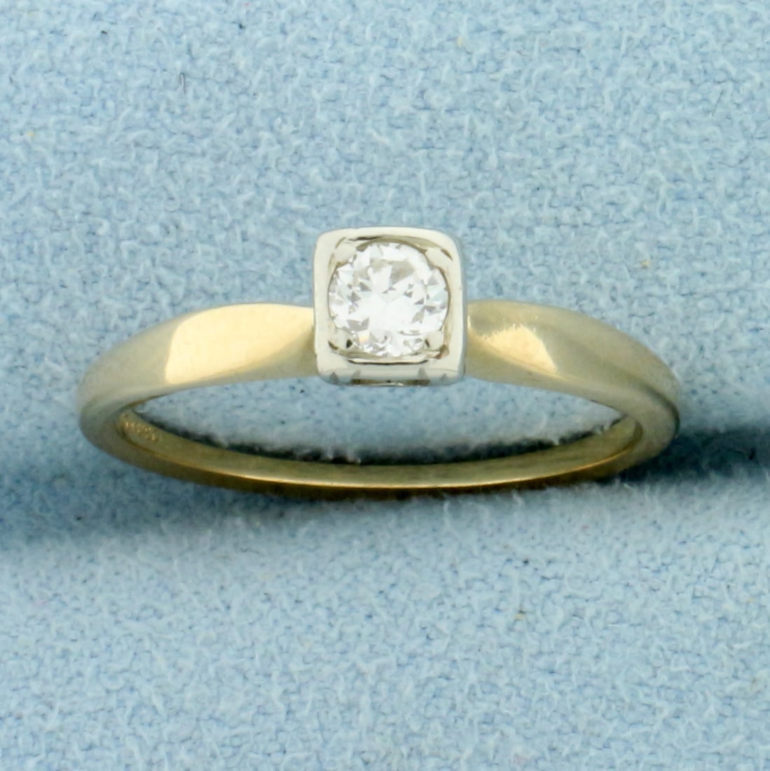 Vintage Diamond Solitaire Engagement Ring in 14K Yellow and White Gold: In 14K Yellow and White Gold. Contains one high quality 1/5ct Diamond, VS clarity/F color, excellent cut for lots of sparkle. Size 6 1/2. 2.2g.