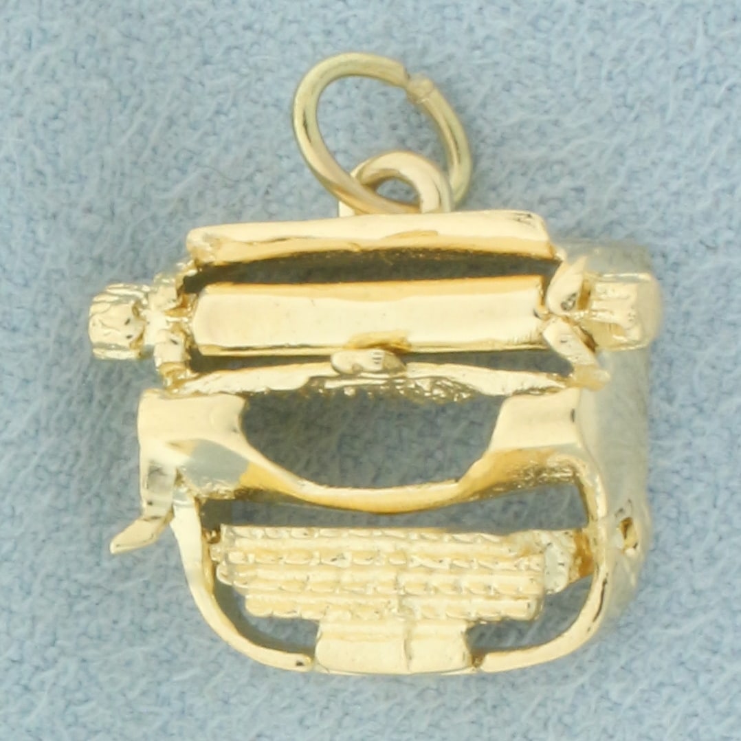 Vintage Typewriter Charm in 14k Yellow Gold: In 14k yellow gold. 5/8 inches by 1/2 inches. 2.5g.
