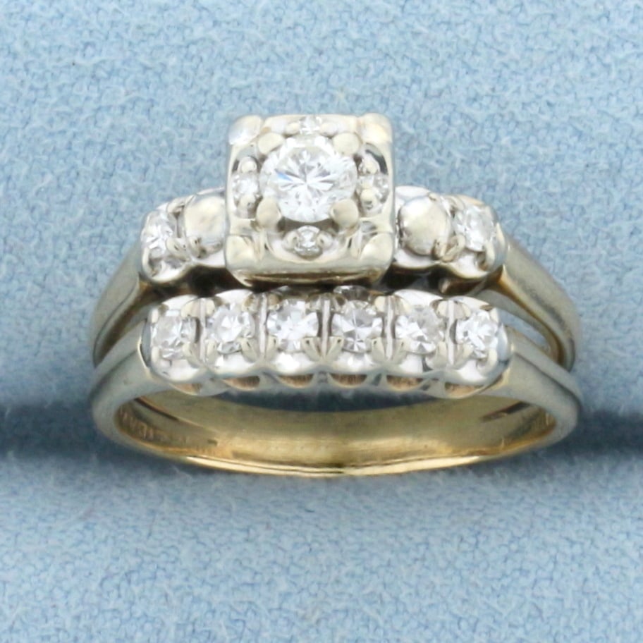 Rays of Love Diamond Designer Engagement Ring and Wedding Band Bridal Set in 14k Yellow Gold: In 14k Yellow Gold. Contains one .15ct, eight .02ct, and four 1/2pt high quality diamonds, SI clarity/G color. Rings are soldered together but can be separated. Size 6.5.g.