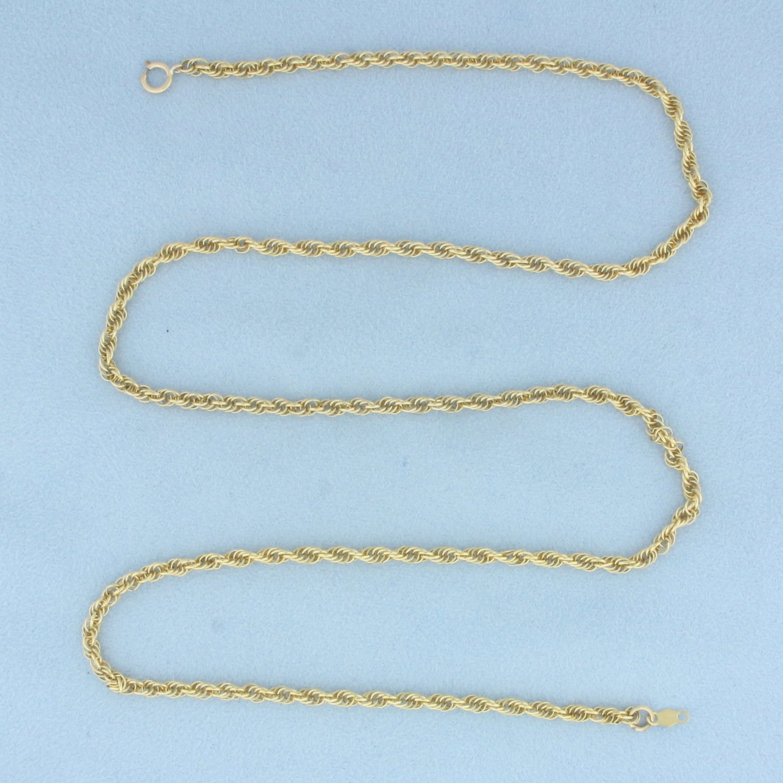 24 Inch Rope Link Chain Necklace in 14k Yellow Gold: In 14k yellow gold. 3mm thick. 24 inches long. Spring clasp. 11.6g.