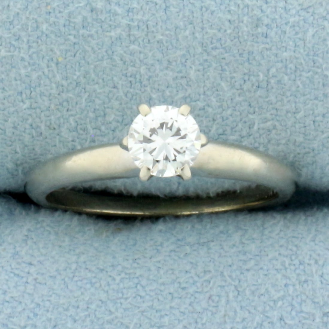 Diamond Solitaire Engagement Ring in 14k White Gold: In 14k white gold. Contains one high quality .4ct round brilliant diamond,SI1 clarity/F color, great cut for lots of sparkle, eye clean. Size 5. 2.2g.