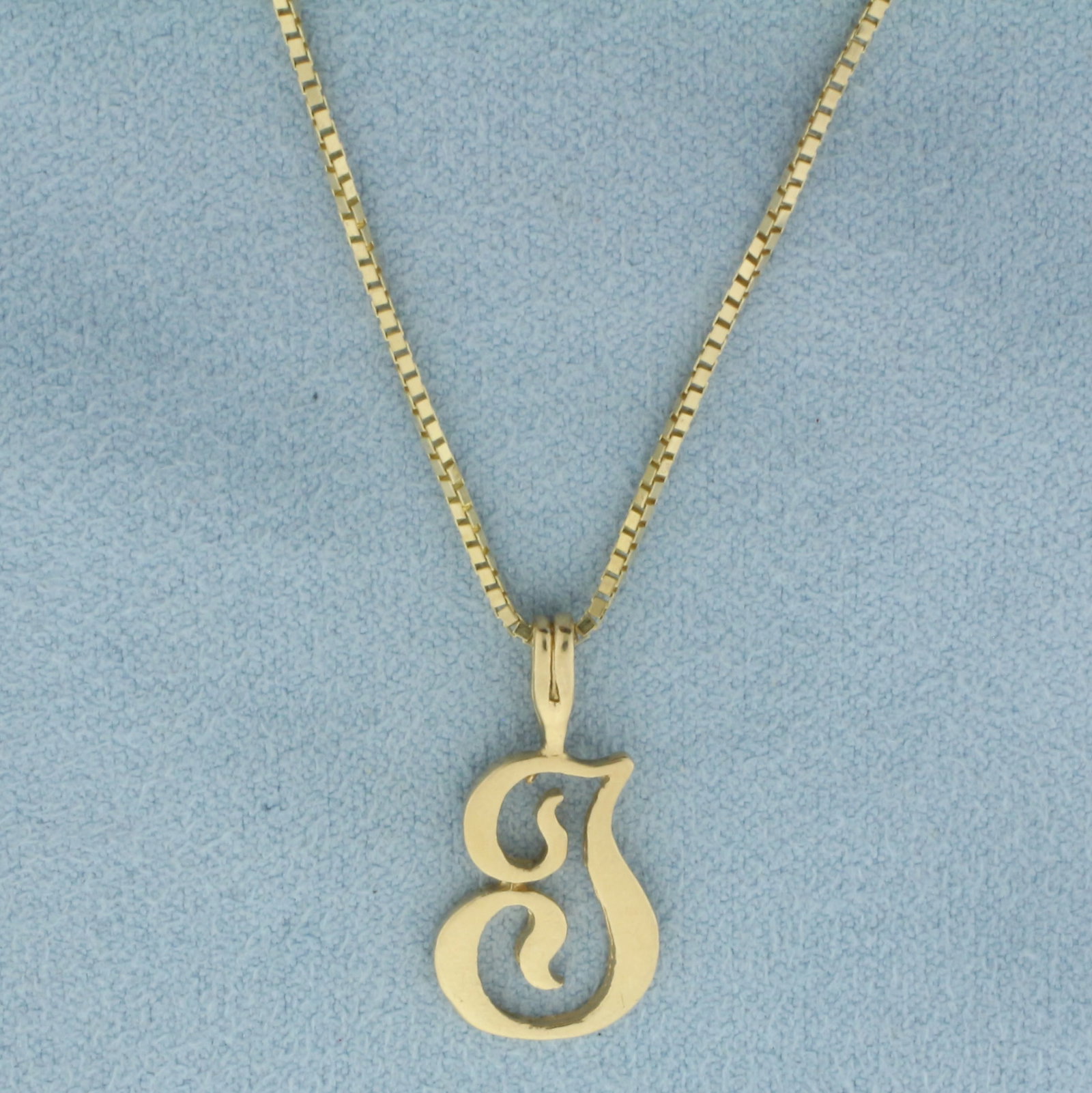 J Initial Necklace in 14k Yellow Gold: In 14k Yellow Gold. Chain is Italian made, box link, 18 1/4 inch long by 1.1mm wide, spring clasp. "J" pendant is 7/8 inch long. 1/2 inch wide. 4.6g.