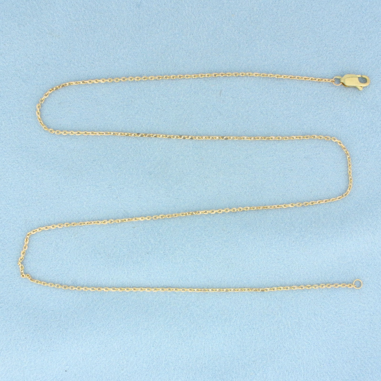 16 Inch Cable Link Chain Necklace in in 14k Yellow Gold: In 14k Yellow Gold. 16 inches long. 1mm wide. Lobster clasp. 2.5g.