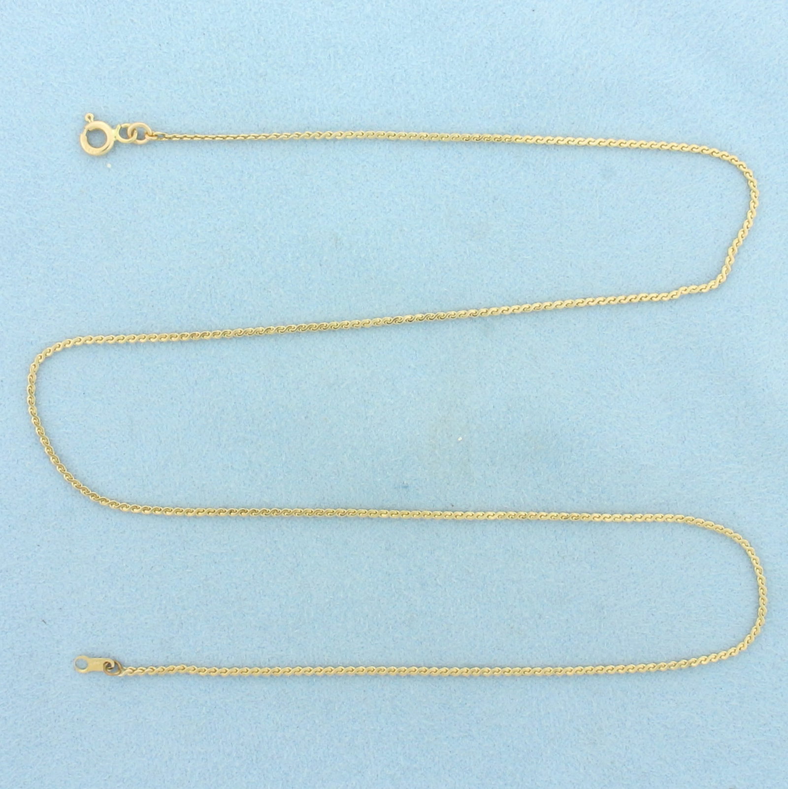 17 Inch S-Link Serpentine Chain Necklace in 14k Yellow Gold: In 14k Yellow Gold. 17 inches long. 1.2mm wide. Spring clasp. 2.9g.