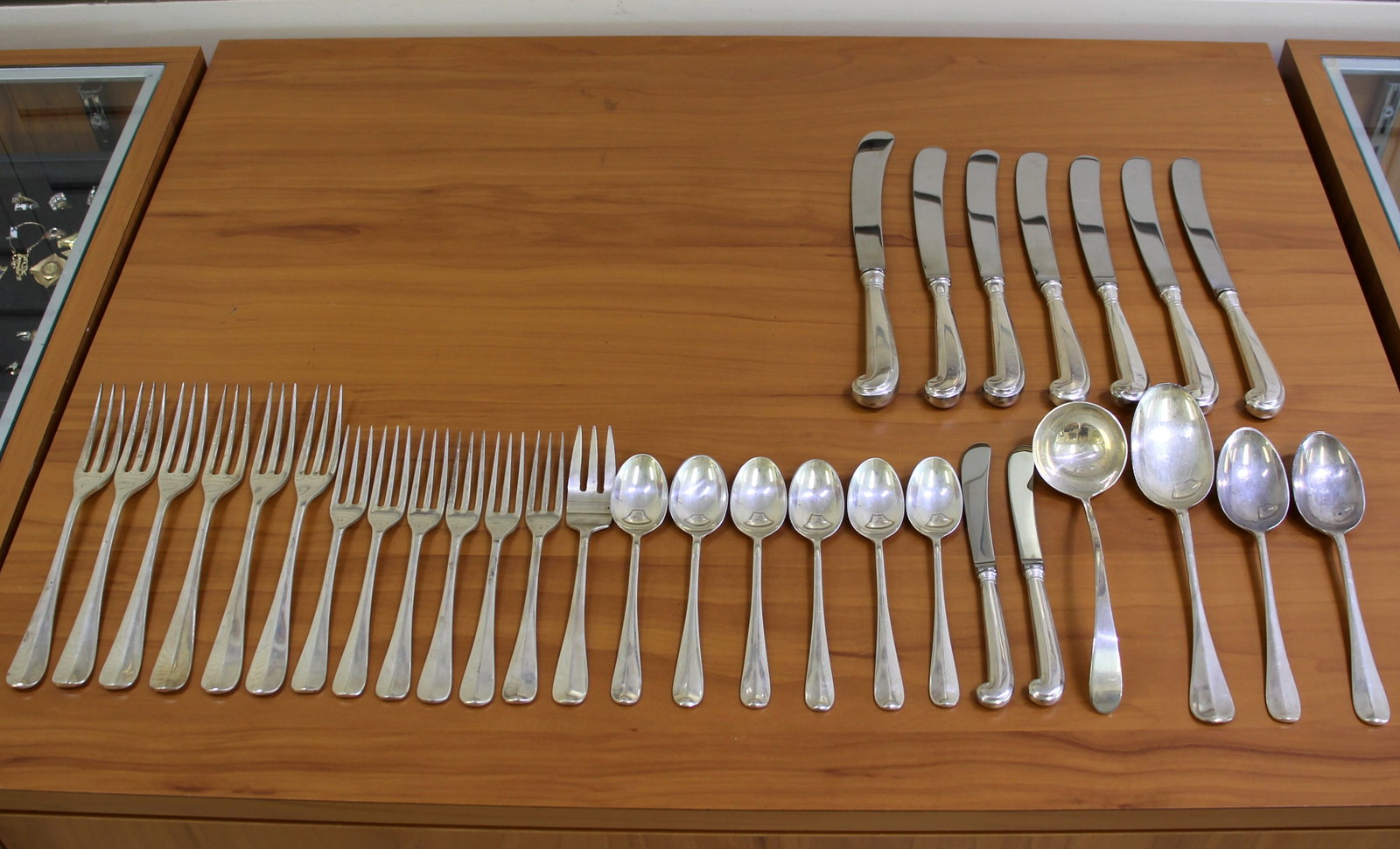 Kirk Stieff "Williamsburg Queen Anne" Sterling Silver Flatware Set of 32: In .925 Sterling Silver. Set includes: six forks, 7 3/4 inches (long tines); six salad forks, 6 1/2 inches (long tines); six teaspoons, 5 3/4 inches; two dessert oval soup serving spoons, 6 3/4 inches