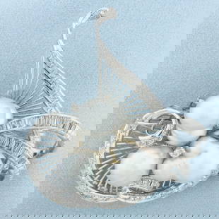 Diamond and Baroque Pearl Pendant Brooch Pin in 14k White Gold: In 14k white gold. Designer: Chan Kwongkee. Contains 1ct TW of high quality round and baguette diamonds, VS clarity/G color. Als contains 3 baroque pearls, 14 16mm at widest points, with vibrant silve