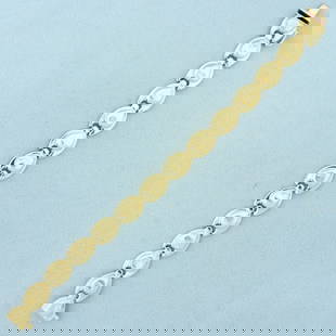 Abstract Designer Link Bracelet in 14K Yellow Gold: In 14K Yellow Gold. 7 inches long, 9.7mm wide. Safety clasp. Some links have small dents in them, does not take away from beautiful of bracelet, they blend into design. 10.0g.