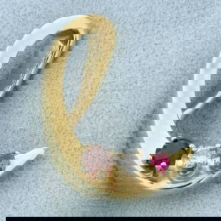 Abstract Design Diamond Garnet and Topaz Slide Pendant in 14k Yellow Gold: 14k yellow gold. Contains one 3.6mm high quality natural garnet gemstone with deep color and excellent clarity. Also contains one .08ct high quality diamond, H color/I clarity. Also contains one 2mm h