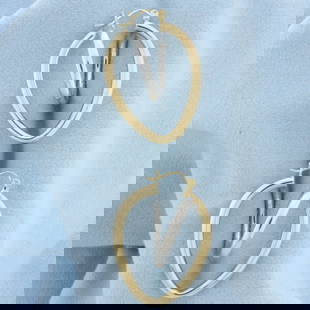 Abstract Heart Hoop Earrings in 14k White and Yellow Gold: In 14k white and yellow gold. 1 1/2 inches long and 1 inch wide. 4.8g.