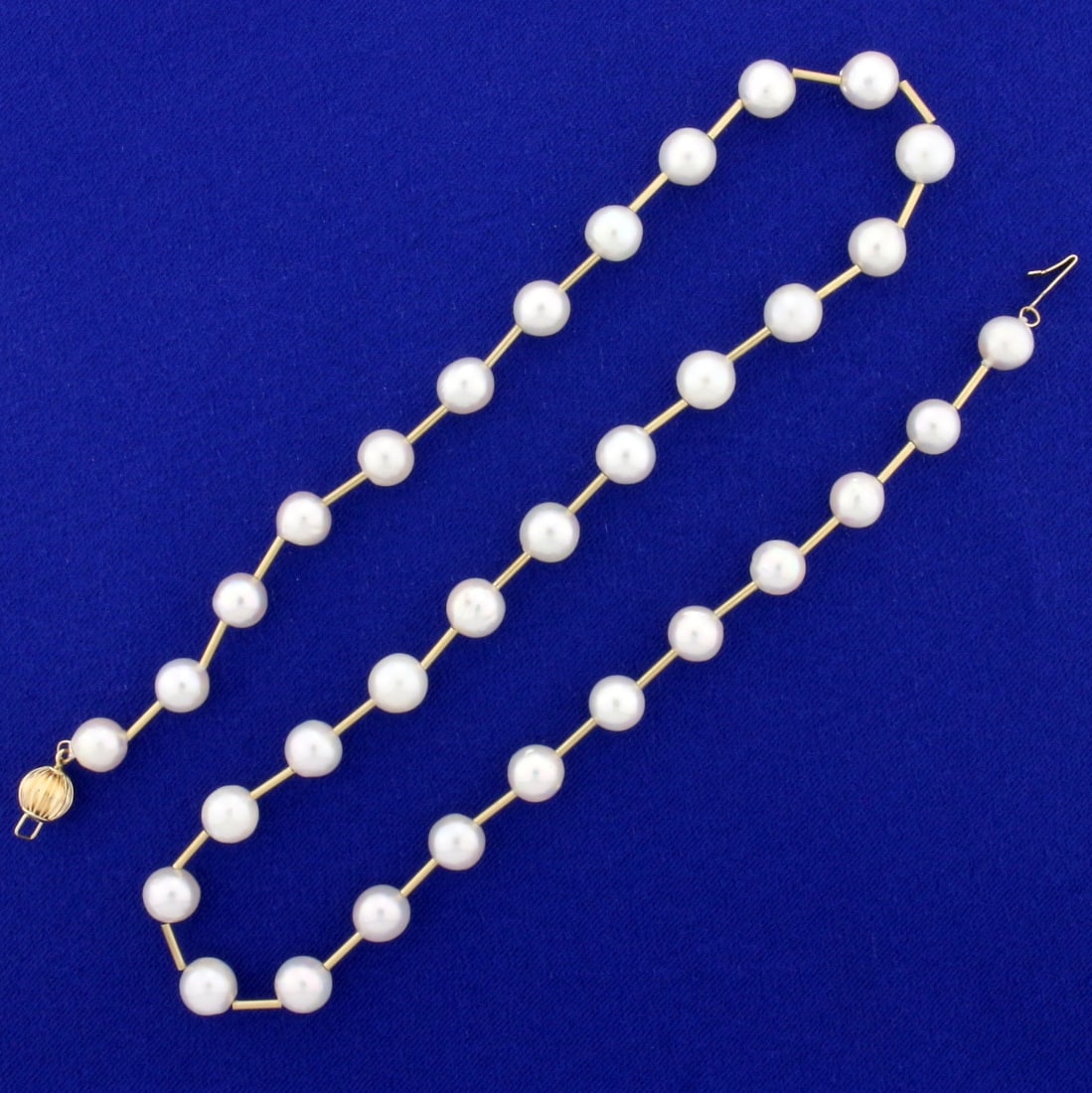 Cultured Pearl and Gold Bar Necklace in 14K Yellow Gold: In 14K Yellow Gold. Contains thirty three high quality freshwater 7mm Cultured Pearls with beautiful color and mirror like luster. 18 inches long. 19.3g