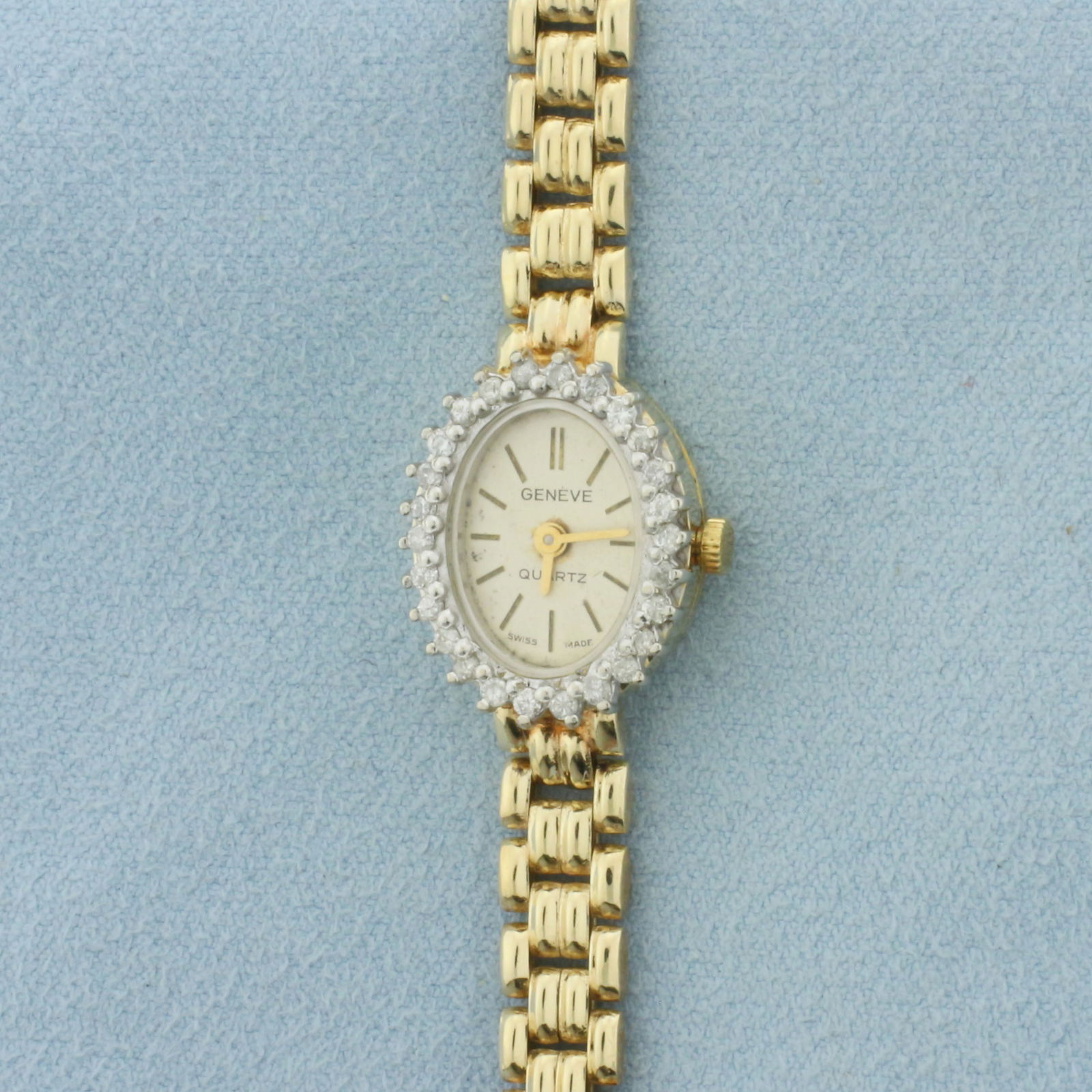 Vintage Diamond Geneve Panther Bracelet Dress Watch in 14k Yellow Gold: In Solid 14k Yellow Gold Case and Bracelet. Swiss made quartz movement runs great. Contains twenty-six high quality .01ct diamonds around bezel. 7 1/8 inches long. 16mm wide case. New battery - runs g