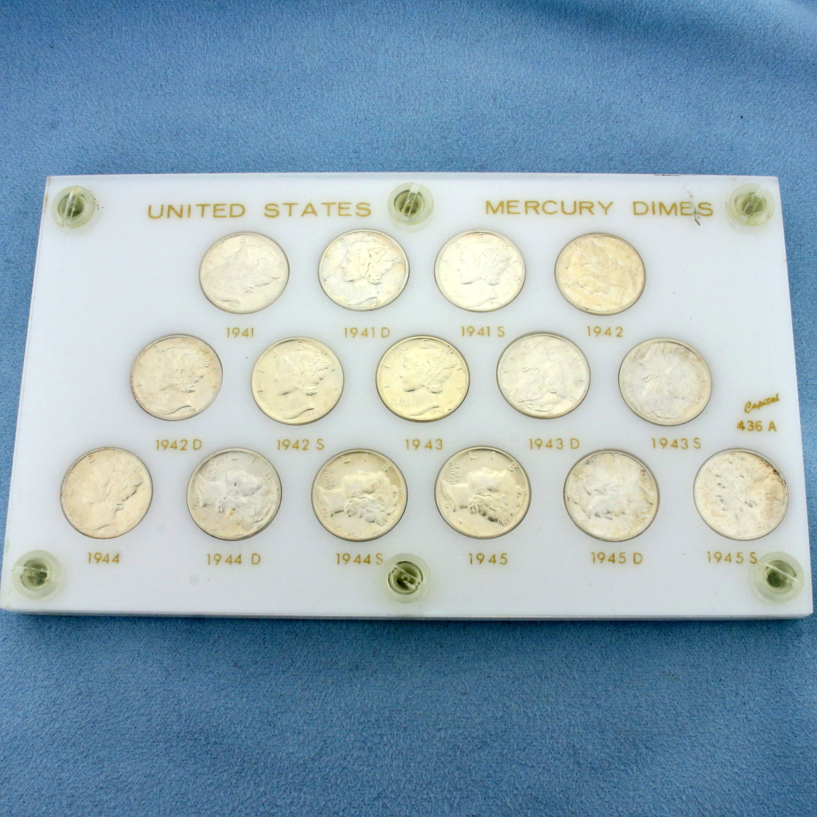 1941-1945 Brilliant Uncirculated Mercury Dimes Coin Set: Complete collection of Uncirculated U.S. Mercury Dimes ranging from 1941-1945. Set in Lucite.
