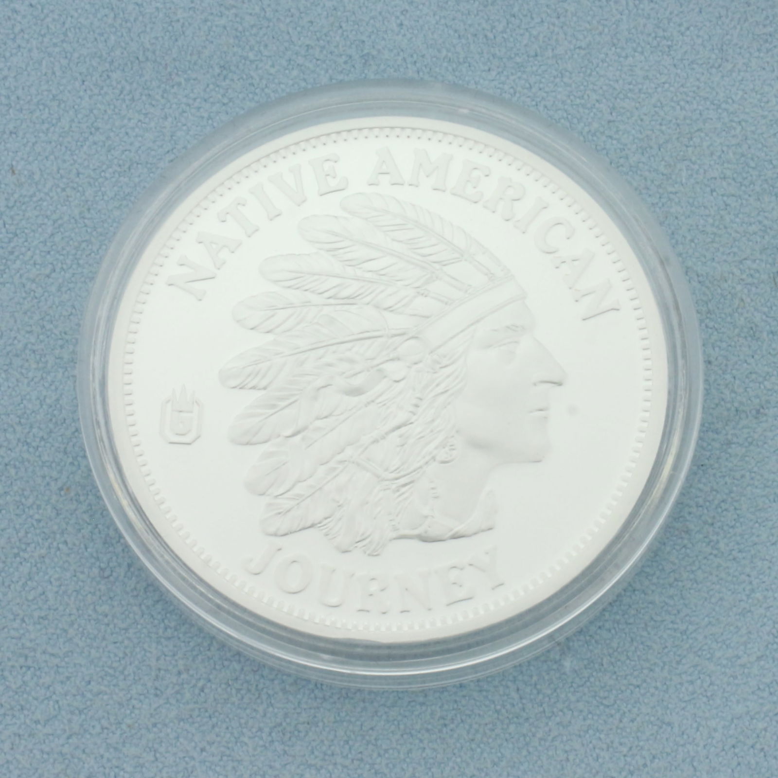 American Mint Native American Journey Proof Coin: In Copper Silverplate. Contains one Native American Journey Coin. Includes plastic casing. 32g.