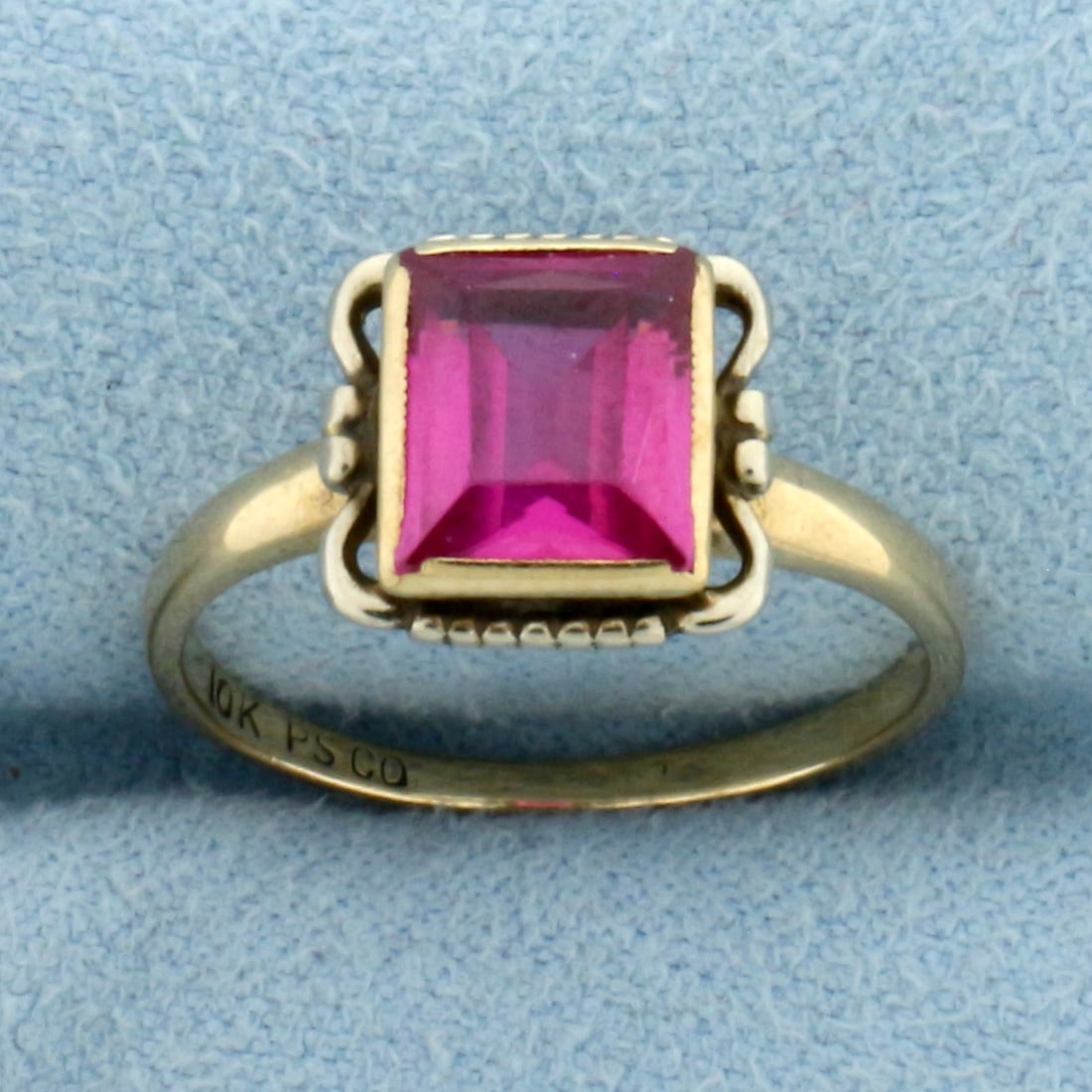Vintage Pink Sapphire Ring in 10k Yellow Gold: In 10k Yellow Gold. Contains one high quality mm8x6mm Pink Sapphire gemstone with vibrant color and excellent clarity. Size 5.25. 2.1g.