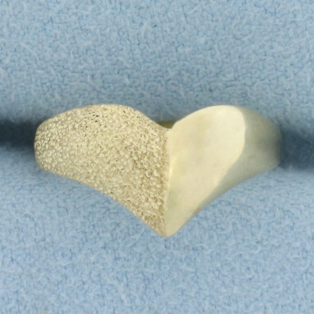 Beverly Hills Gold Designer Heart Ring in 14k Yellow Gold: In 14k Yellow Gold. 9.2 mm wide at widest point. Half high polish, half sparkle finish for unique look. 2.5g.