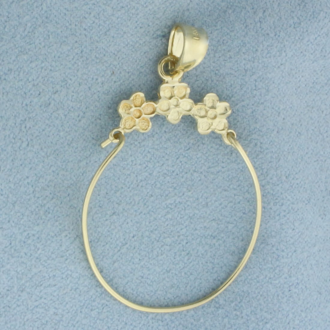 Flower Charm Holder Pendant in 14k Yellow Gold: In 14k Yellow Gold. 1.5 inch long. 1 inch wide. Opens to hang charms off of it. 1.3g.
