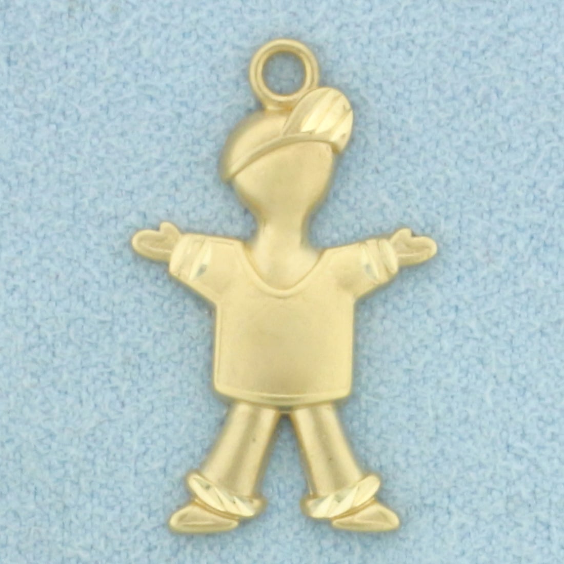 Diamond Cut Little Boy Charm or Pendant in 14k Yellow Gold: In 14k Yellow Gold. 7/8 inch long. 1/2 inch wide. Matte finish. 0.8g.