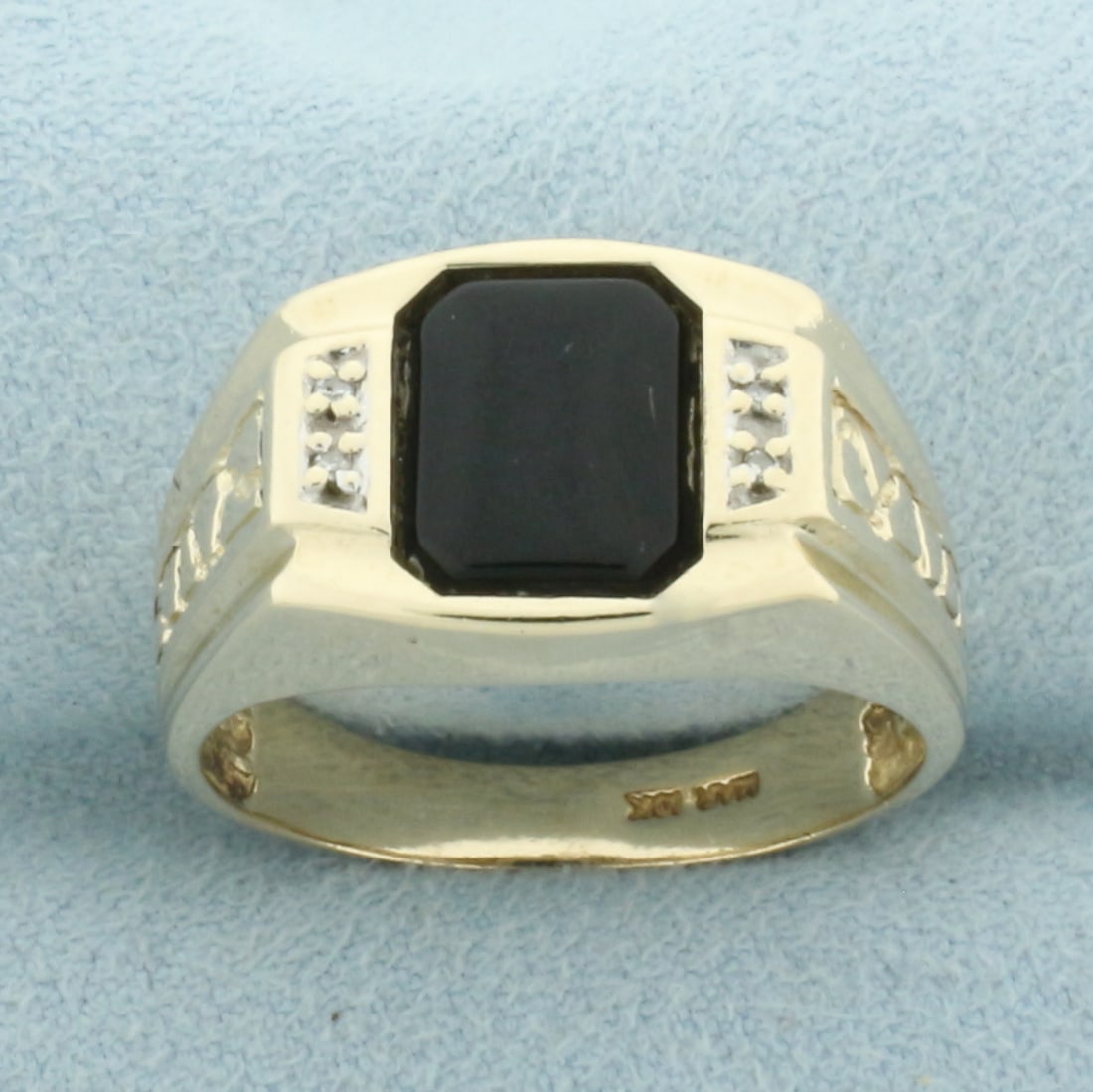 Mens Vintage Onyx and Diamond Ring in 10k Yellow Gold: In 10k Yellow Gold. Contains one 9mm Onyx gemstone. Also contains four high quality 1/2pt diamonds. 11.8mm wide at top. Size 10. 6.2g.