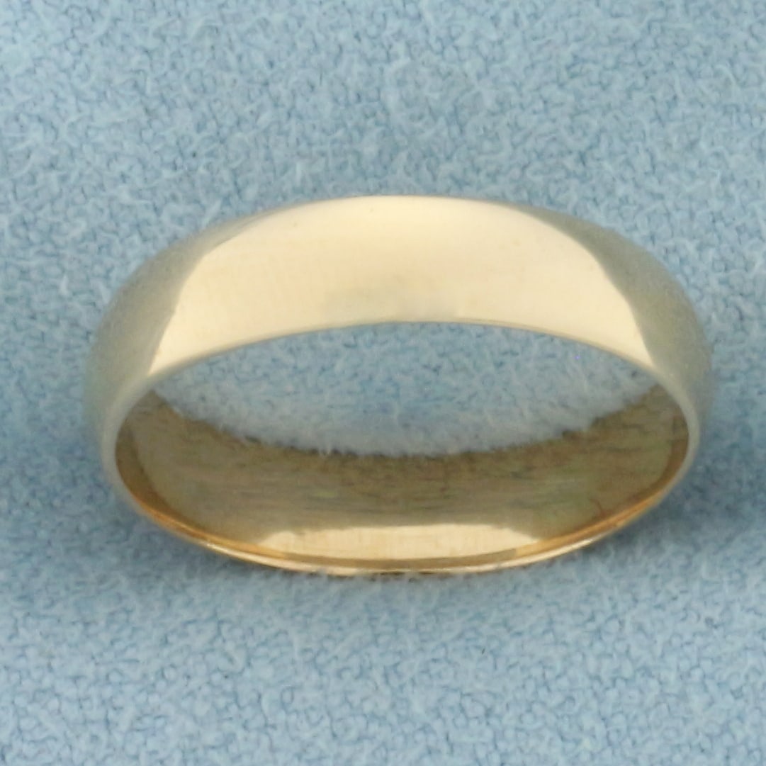 Womans High Polish Half Dome Wedding Band Ring in 18k Yellow Gold: In 18k Yellow Gold. 4mm wide. Size 5.5. 2.4g.