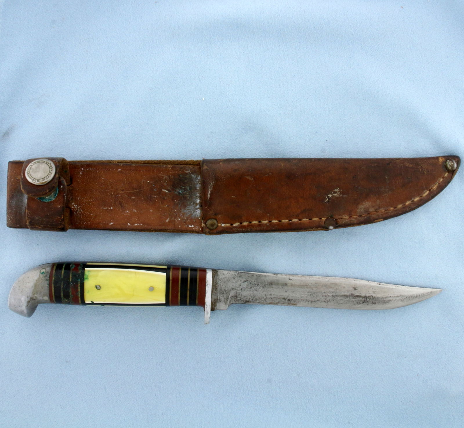 Vintage West Cut Western Cutlery Fixed Blade Knife With Sheath: Made by Western Cutlery, Boulder Colorado. Includes leather sheath. 8 Inches long. Circa 1950s. Signed "PA Bailley" on blade.