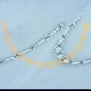 Diamond Cable Link Tennis Bracelet in 14K Yellow and White Gold: In 14K Yellow and White Gold. Contains forty eight high quality Diamonds, 1.5ct TW, SI clarity/I color. 7 1/2 inches long, 9.3mm wide. Safety clasp. 19.3g.