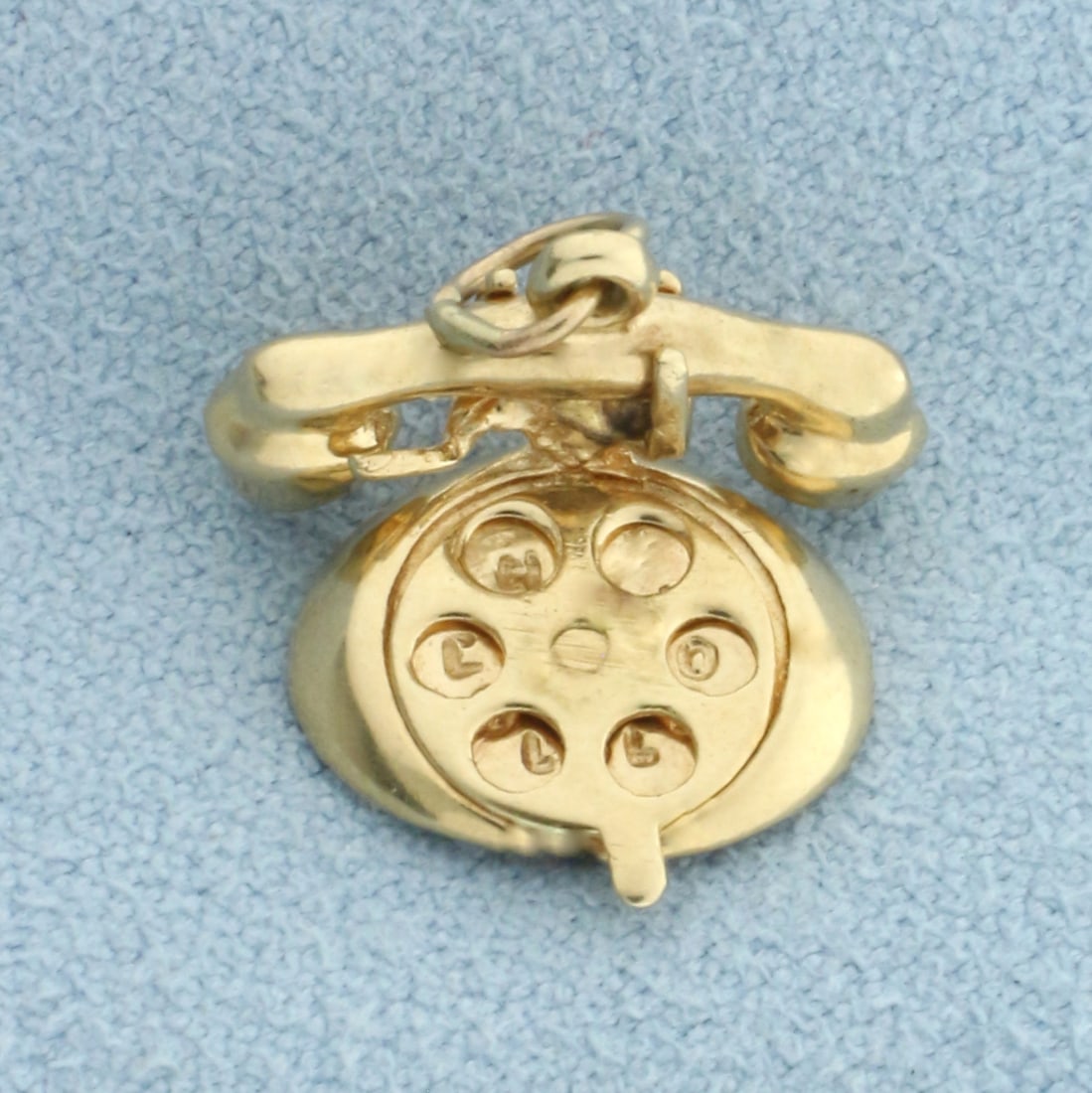 Vintage Telephone Charm in 14k Yellow Gold: In 14k Yellow Gold. 1/2 inch long, 1/2 inch wide. 2.3g.