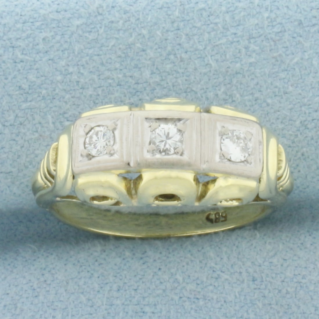 Vintage Filigree Three Stone Diamond Ring in 14k Yellow Gold: In 14k Yellow Gold. Contains three high quality diamonds, 1/5ct TW, VS clarity/H color. 8.7mm wide at widest. Size 7. 3.5g.