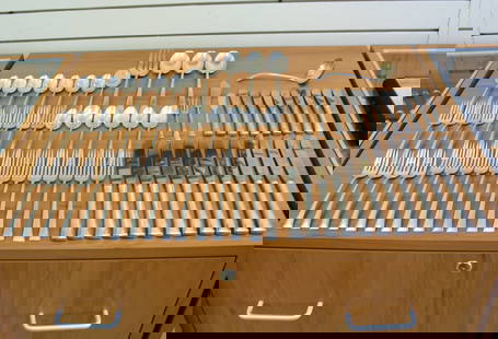 International Serenity Sixty Eight Piece Sterling Silver Flatware Set: In Sterling Silver. Contains twelve forks @ 7 1/4 inches. Twelve salad forks @ 6 1/2 inches. Twelve teaspoons @ 6 inches. Twelve modern knives @ 9 3/8 inches. Ten butter spreaders @ 6 inches. One suga