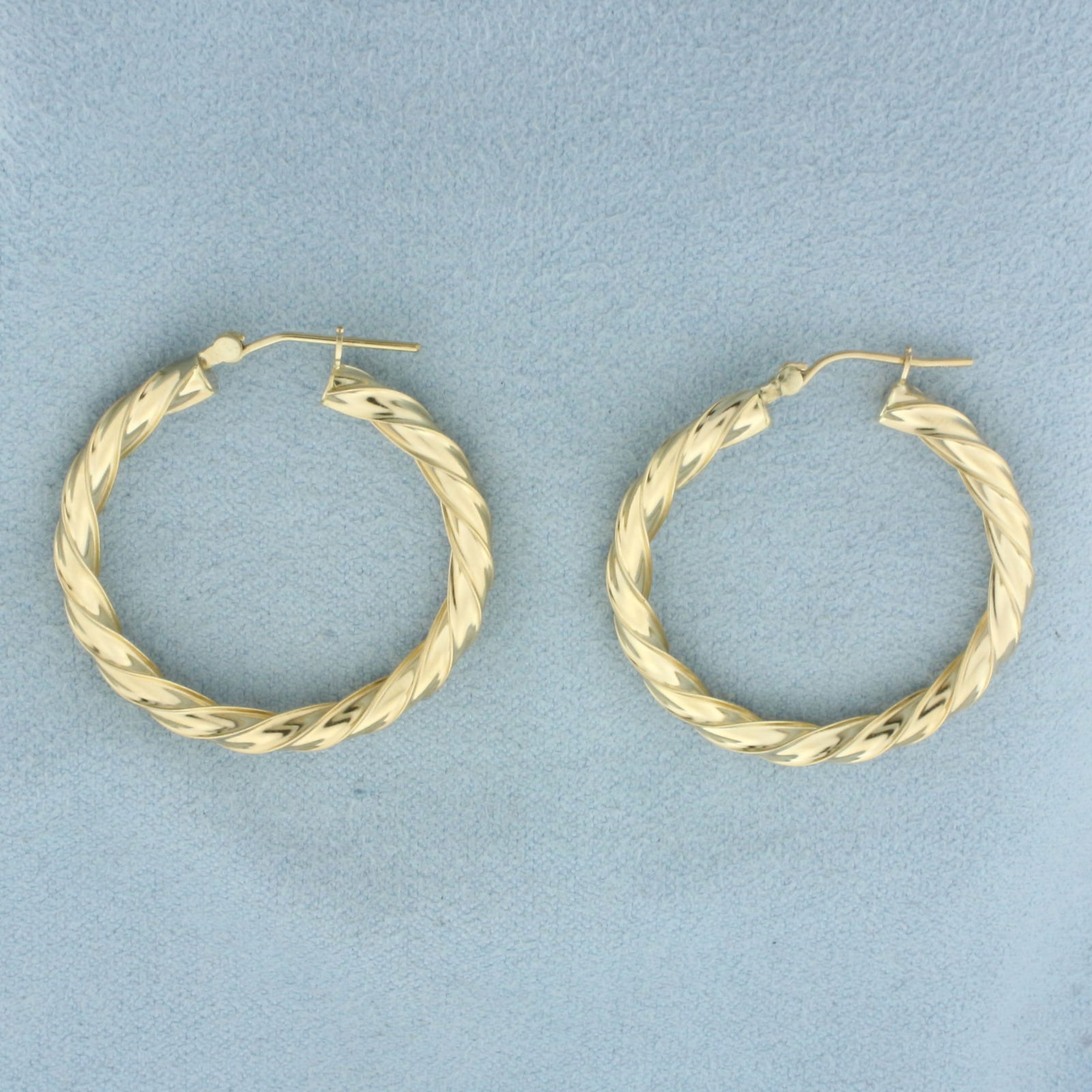 Twisting Hoop Earrings in 14k Yellow Gold (1 of 2)