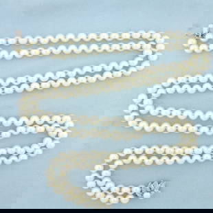 Long 25 Inch Vintage Akoya Pearl Double Strand Necklace in 14K White Gold: 14k White Gold Clasp. Contains one hundred fifty two high quality 7.5mm Cultured Akoya Pearls with high luster. 25 inches long. 97.9g