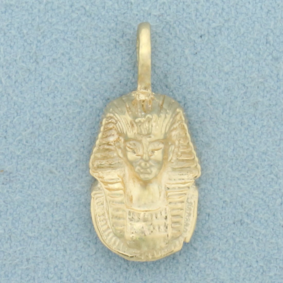 King Tut Egyptian Pharoah Pendant in 14k Yellow Gold: In 14k Yellow Gold. 7/8 inch long. 5/8 inch wide. 2.3g.