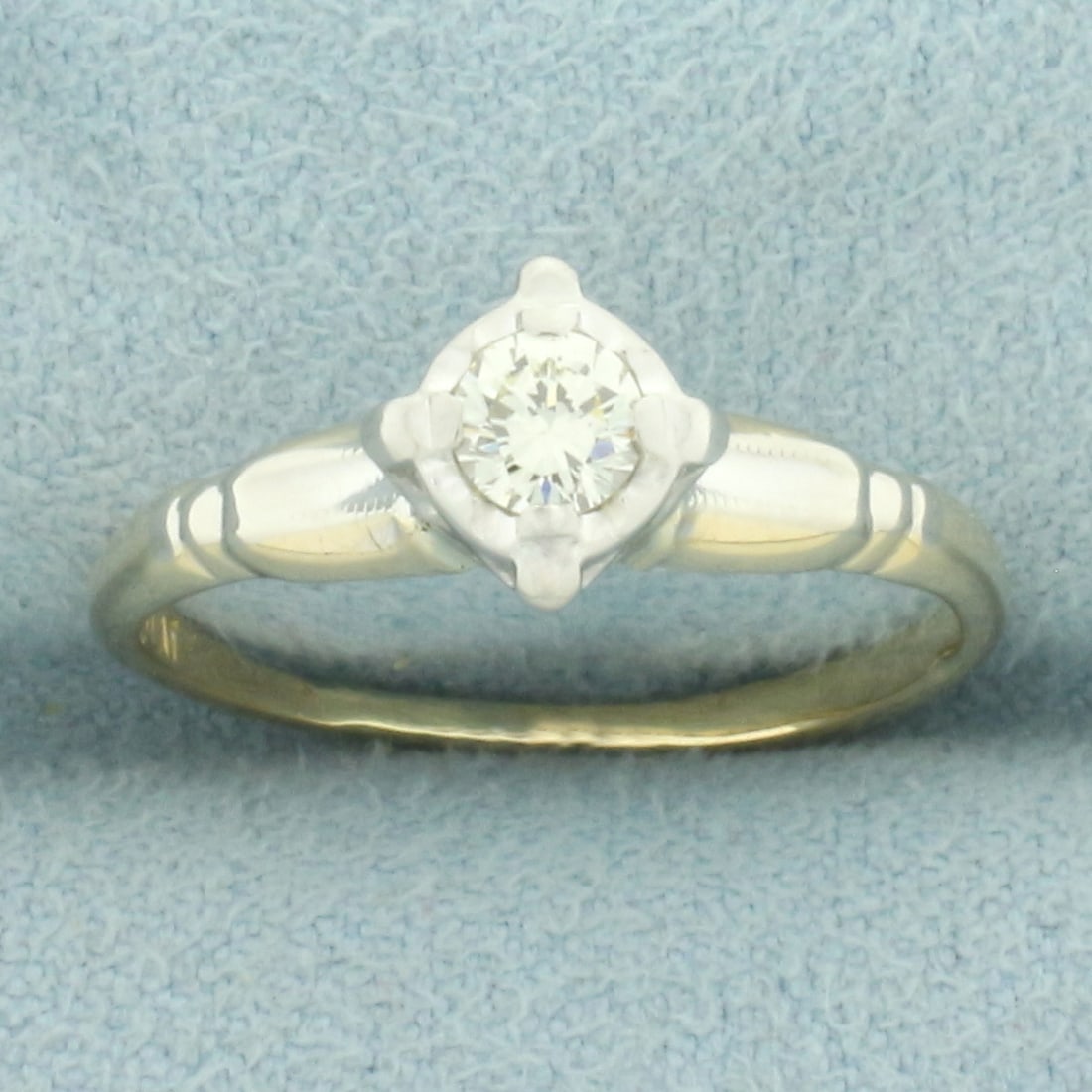 Vintage Diamond Solitaire Engagement Ring in 14k Yellow Gold: In 14k yellow gold and platinum head. Contains one high quality 1/5ct round brilliant diamond, VS clarity/I color, great cut for lots of sparkle. Size: 7. 2.1g.