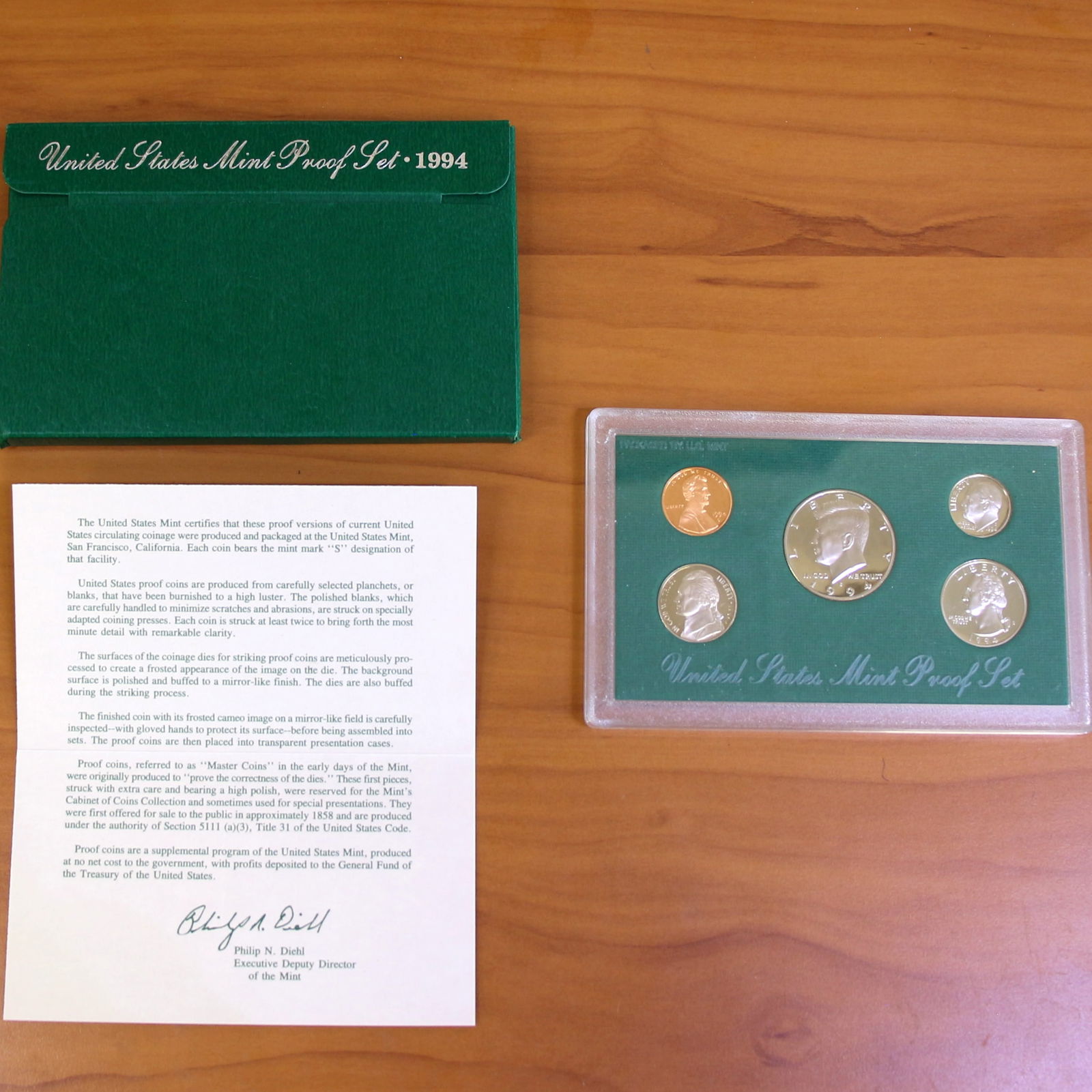 US Mint 5 Proof Coin Set OGP 1994 To 1998: One U.S. Mint Proof 5-Coin Set from years 1994 to 1998. Includes CoA, original packaging, and box.