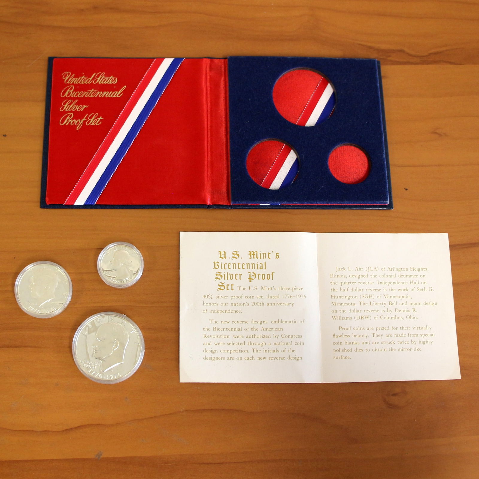 U.S. Bicentennial Silver Proof Coin Set OGP COA: Contains one U.S. Mint 3-Coin Bicentennial Silver Proof Set - dollar, half dollar, and quarter. Includes original casing and CoA.