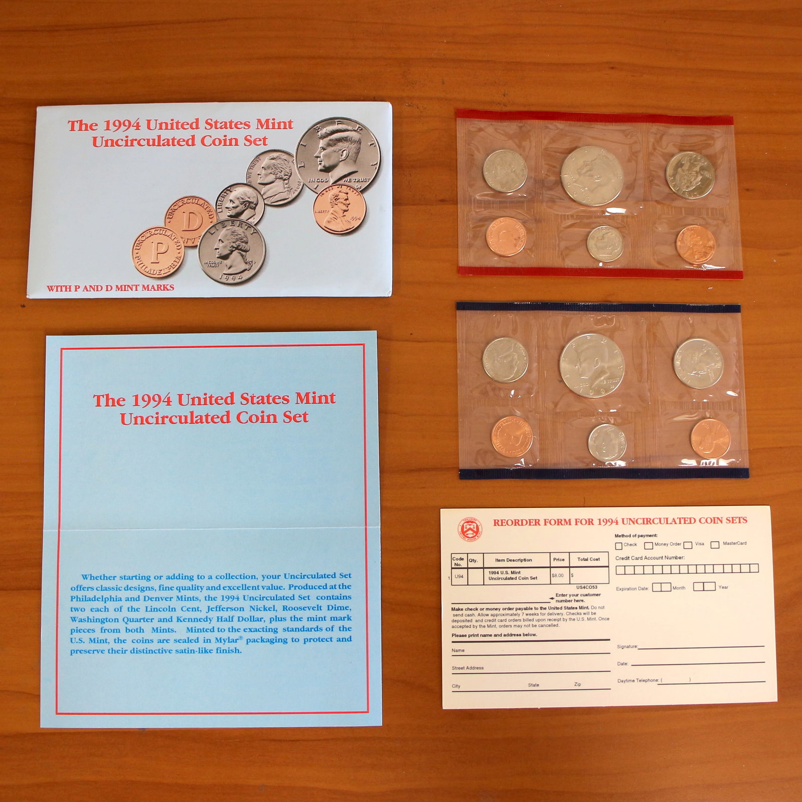 1994 U.S. Mint Uncirculated Coin Set Philadelphia and Denver OGP COA: Contains one 1994 Philadelphia Mint Uncirculated Proof Set and one 1994 Denver Mint Uncirculated Proof Set. Includes original casing, envelope, CoA, and reorder form.