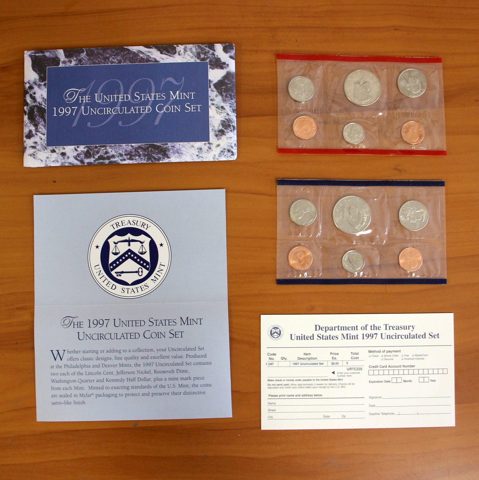 1996 U.S. Mint Uncirculated Coin Set Philadelphia and Denver OGP COA: Contains one 1994 Philadelphia Mint Uncirculated Proof Set and one 1994 Denver Mint Uncirculated Proof Set. Includes original casing, envelope, CoA, and reorder form.