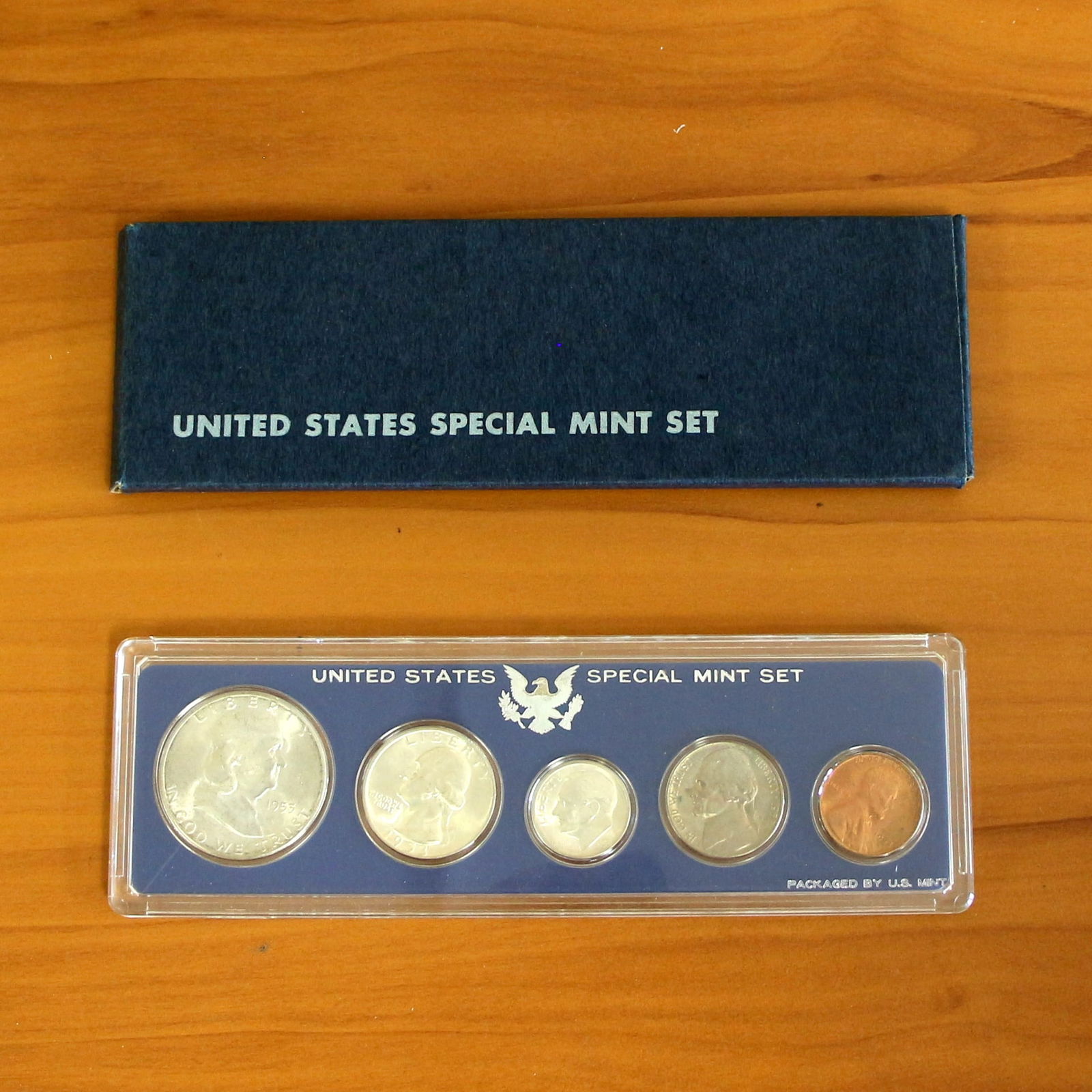 1953 U.S. Special Mint Coin Set OGP: Contains one 1953 U.S. Special Mint Proof Set. Includes original packaging and casing.