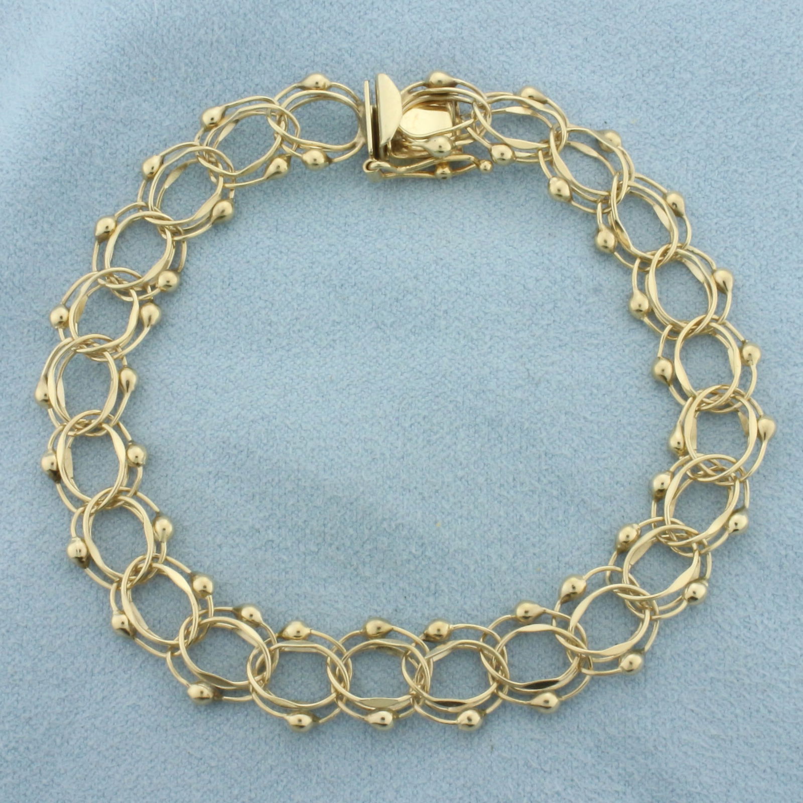Double Loop Charm Bracelet in 14k Yellow Gold (1 of 2)