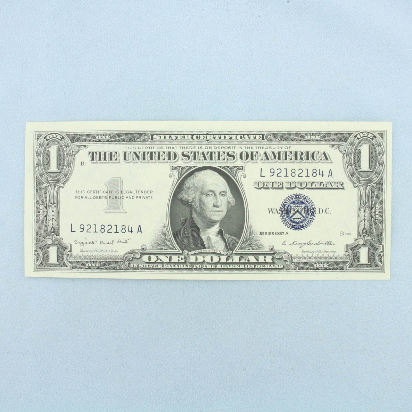 1957 $1 Crisp Uncirculated Silver Certificate Blue Seal Bill: $1 One Dollar Silver Certificate in crisp uncirculated condition. No rips or tears or folds on note, crisp.