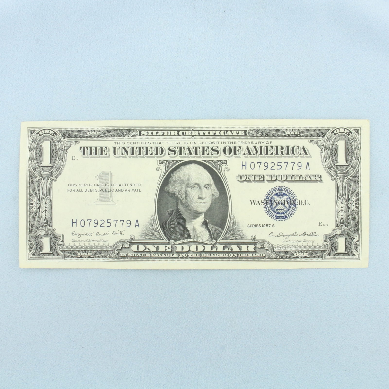 $1 Uncirculated Silver Certificate Blue Seal Bill: $1 One Dollar Silver Certificate in uncirculated condition. Will be send bill from 1935 or 1957. No rips or tears on note.