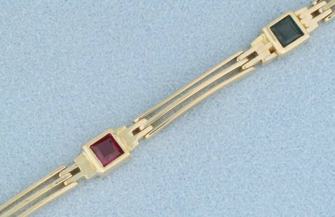 Rainbow Sapphire Bracelet in 14k Yellow Gold: In 14k yellow gold. Contains six 1/3ct High Quality Natural Sapphire gemstones in various colors, 2ct TW, with vibrant color and excellent clarity. 7 1/2 inches long, Lobster clasp. 11.2g.
