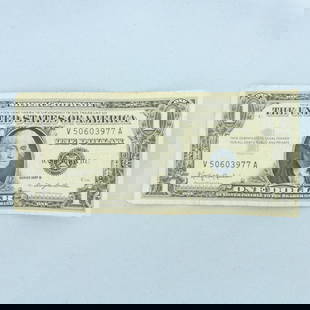 1957 $1 Silver Certificate Blue Seal Bill: $1 One Dollar Silver Certificate banknote with a blue seal, circulated condition. No rips or tears on note, typical circulated condition.