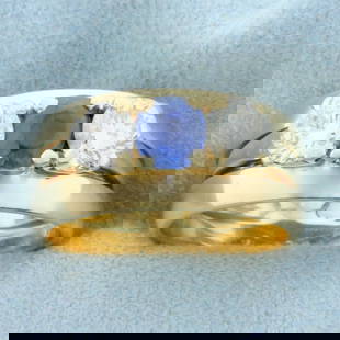 Vintage Three Stone Sapphire and Diamond Wedding or Anniversary Ring in 14k Yellow Gold: In 14K Yellow Gold. Contains one high quality natural AAA quality 1/2ct Sapphire gemstone with vibrant blue color and excellent clarity. Also contains two high quality 1/2ct round brilliant cut Diamon