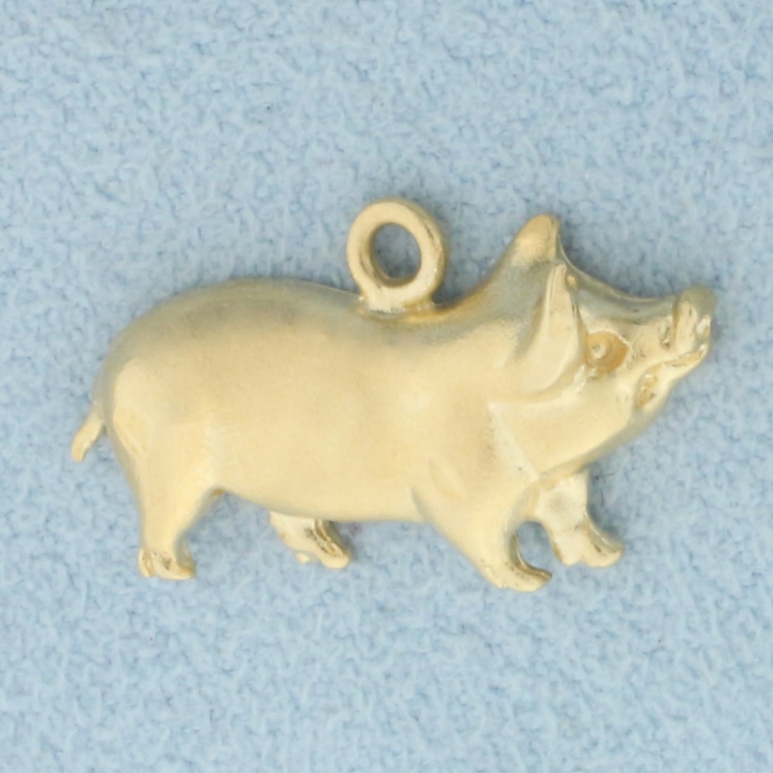 Pig Charm or Pendant in 14k Yellow Gold: In 14k yellow gold. 3/4 inch long and 3/8 inch wide. 1.5g.