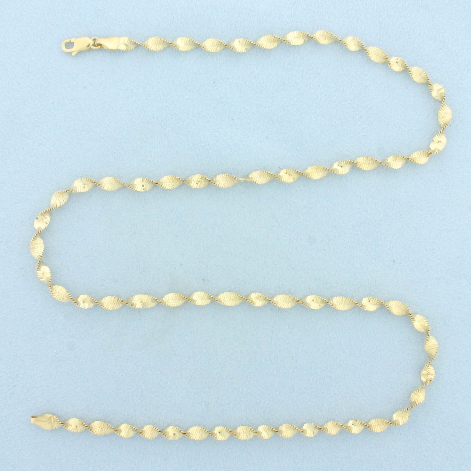 Italian 20 Inch Twisting Herringbone Link Chain Necklace in 14k Yellow Gold (1 of 2)